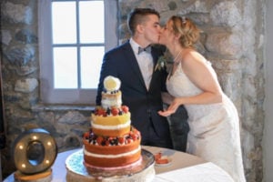 Cake Cutting 2017 Military Wedding Giveaway winners Taylor and Ryan Castle Farms