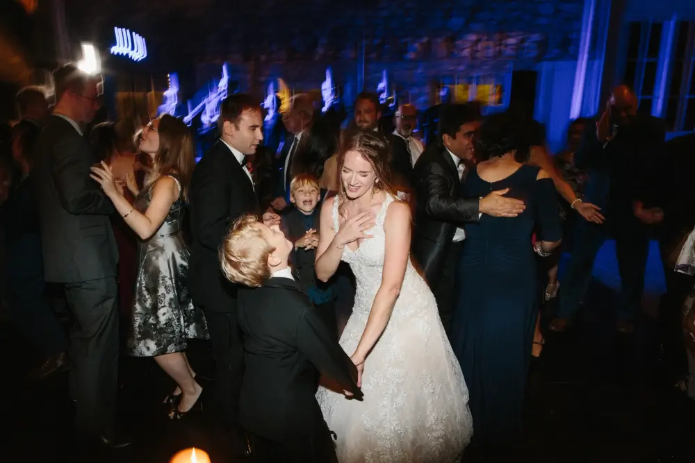 Wedding Bride and Kid Dancing