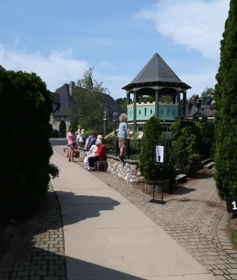 A sidewalk leading to a playground at Castle Farms.
