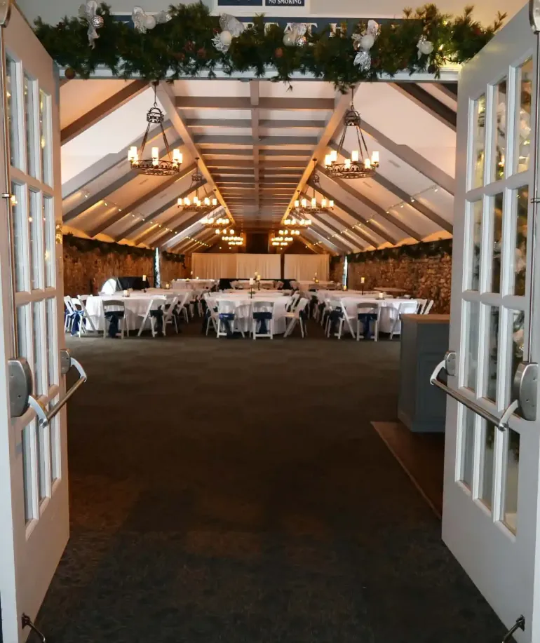 Doors opening to a holiday party at Castle Farms