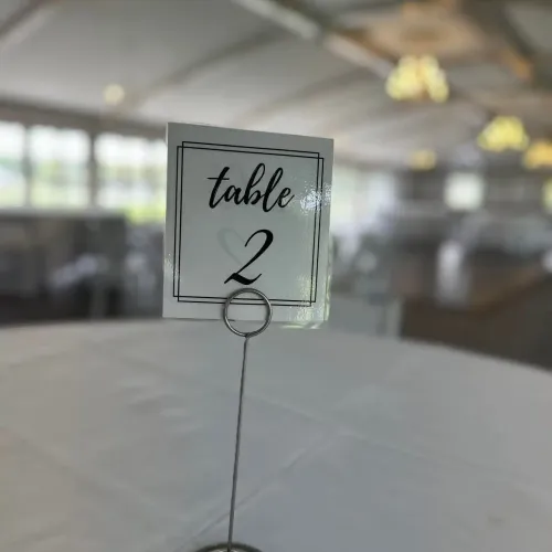 A table marker labeled "Table 2" on a table at Castle Farms.