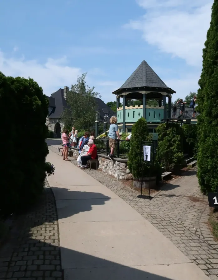 A sidewalk leading to a playground at Castle Farms.