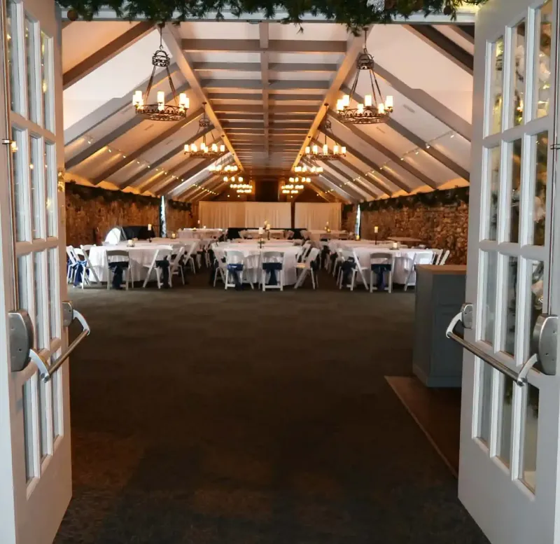 Doors opening to a holiday party at Castle Farms