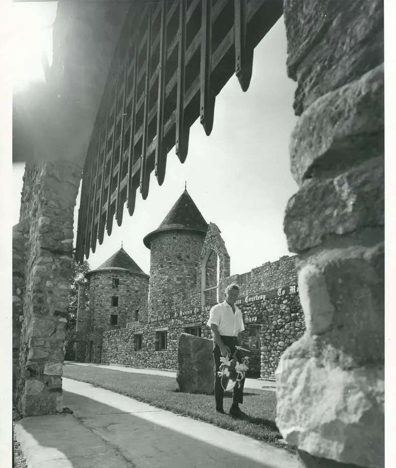 John Van Haver by a metal gate at Castle Farms.