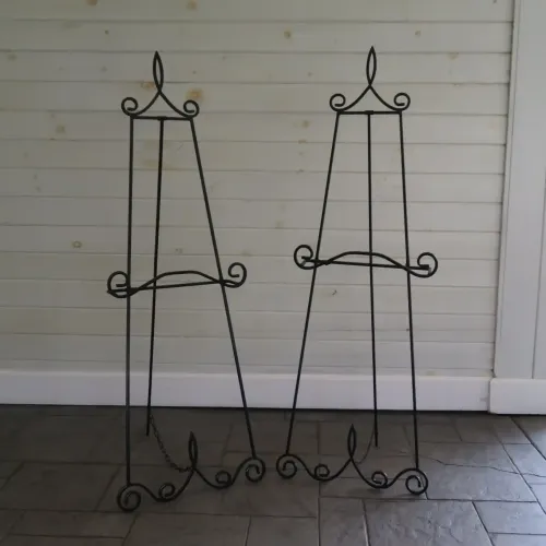 Two easels inside an event space at Castle Farms.